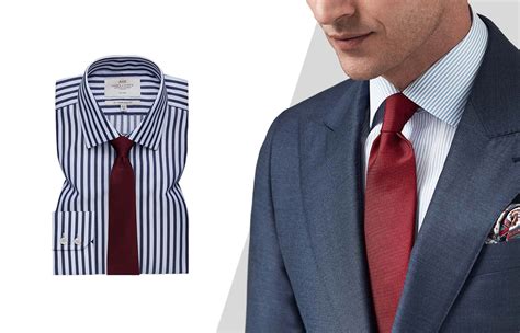 solid tie with striped shirt.